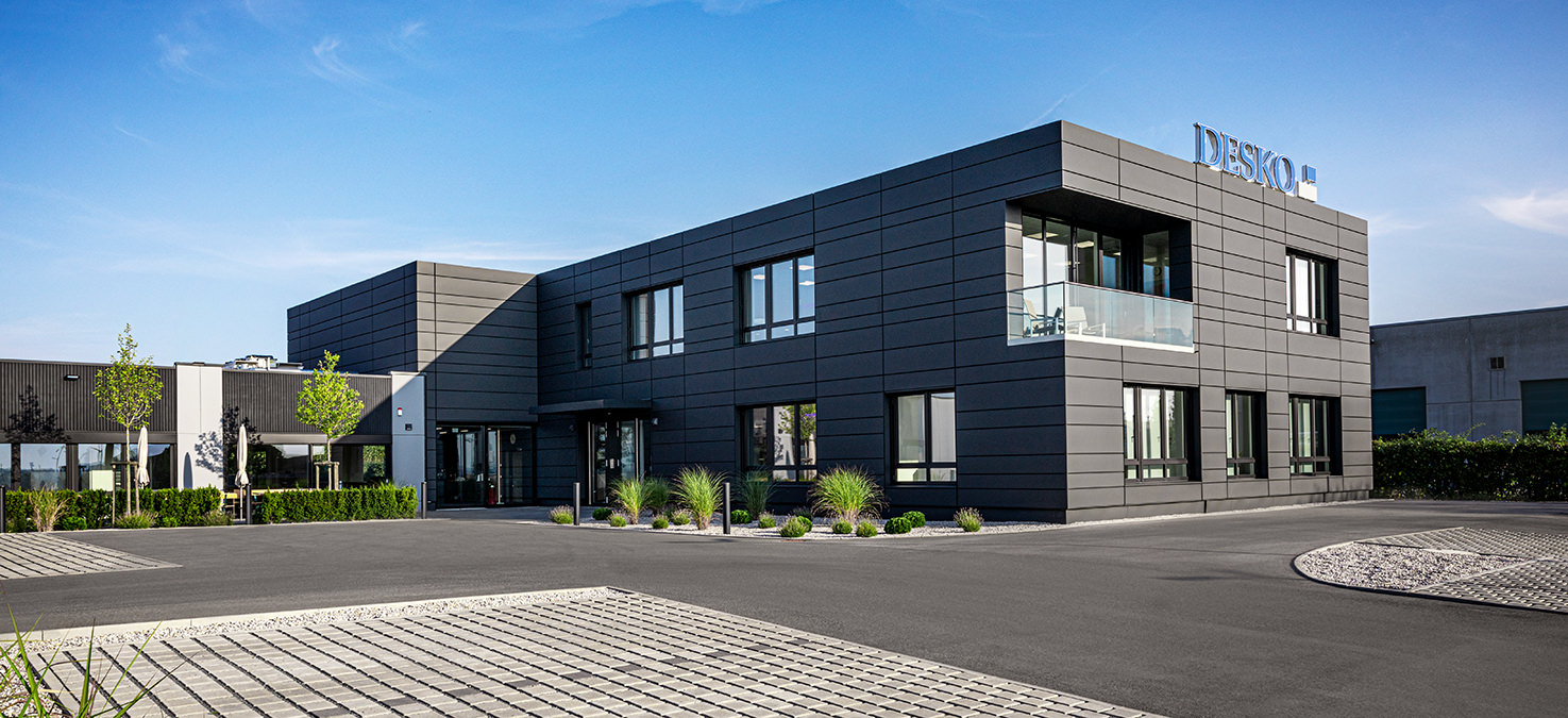 Panoramic view of the exterior of the DESKO company building at the headquarters in Bayreuth, Germany.